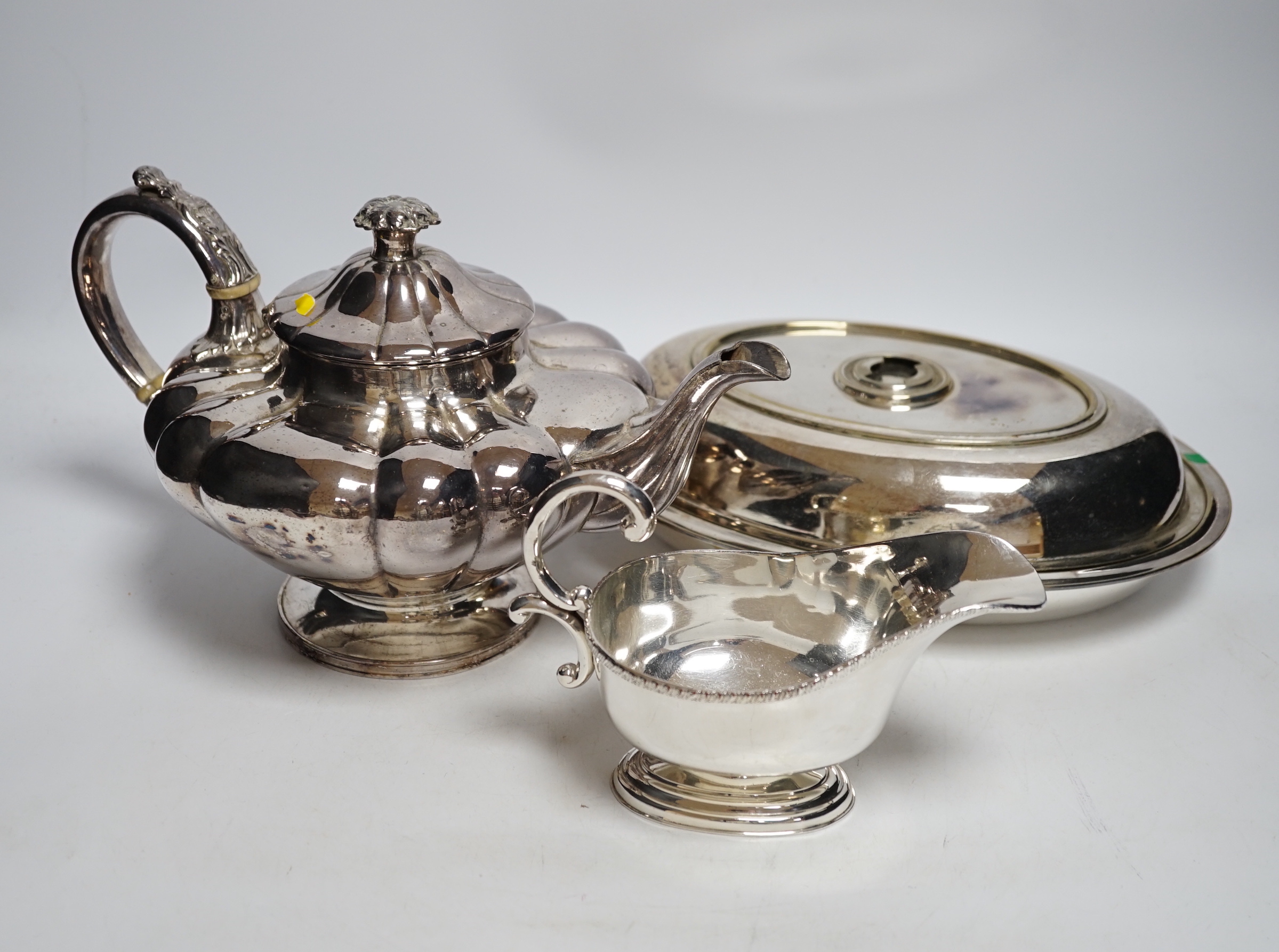 Plated wares, including trays, salvers, a lidded biscuit box, a sauceboat etc.